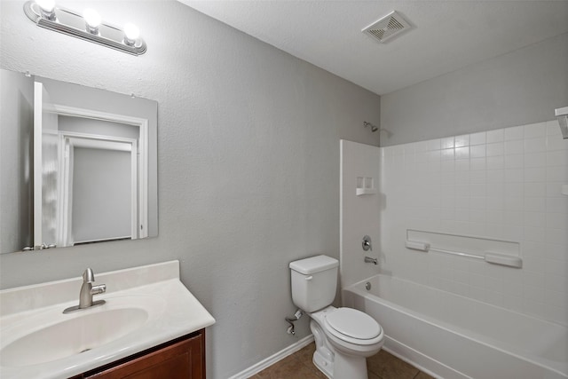 full bathroom with shower / washtub combination, toilet, tile patterned flooring, and vanity