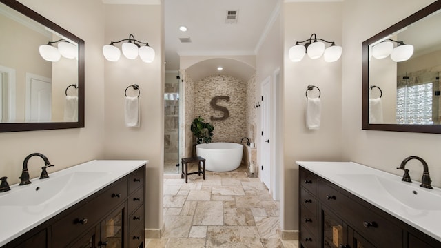 bathroom with vanity, independent shower and bath, and ornamental molding