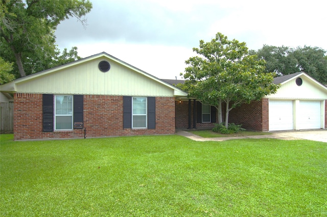 ranch-style house with a garage and a front lawn