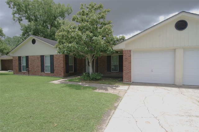 single story home featuring a front yard and a garage