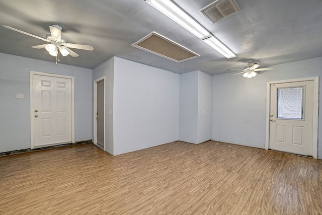 unfurnished room featuring light hardwood / wood-style flooring and ceiling fan