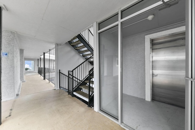 7600 Seawall Blvd Unit 115, Galveston, TX 77551 - corridor featuring stairs