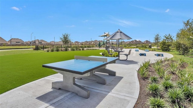 5310 Quartz Ranch Dr, Richmond, TX 77469 - view of patio / terrace with playground community and a residential view
