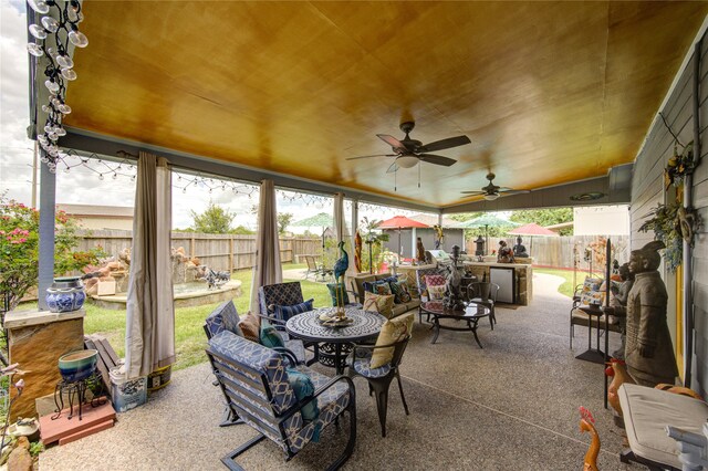 view of patio with ceiling fan