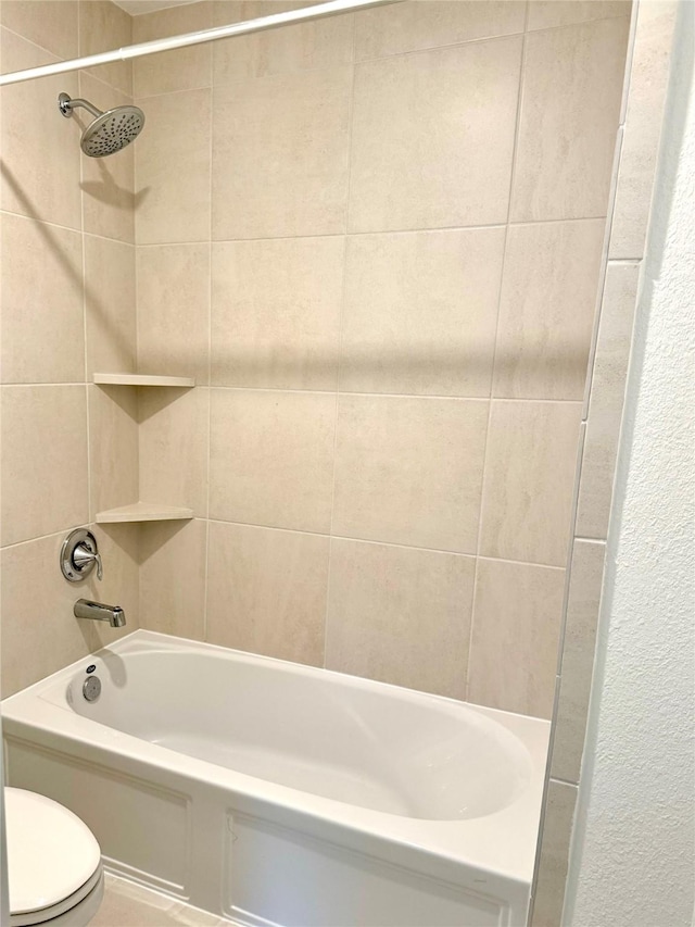 bathroom with toilet and shower / bathtub combination