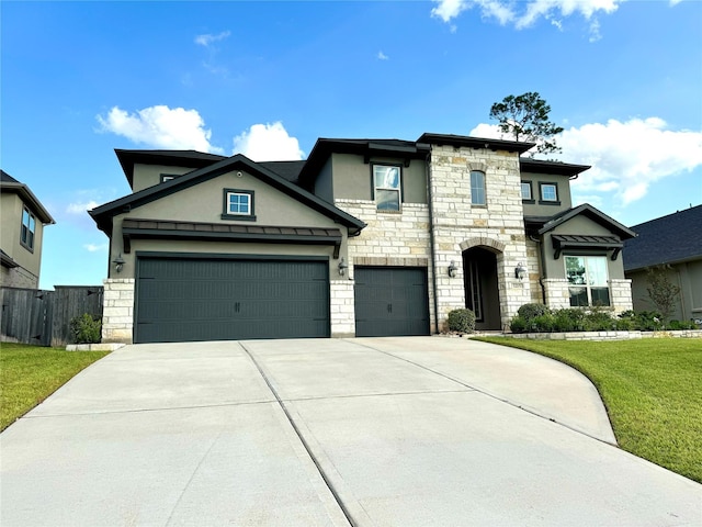 view of front of house featuring a garage, stone siding, driveway, and stucco siding