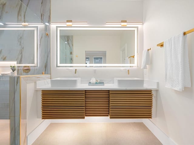 bathroom featuring vanity and walk in shower