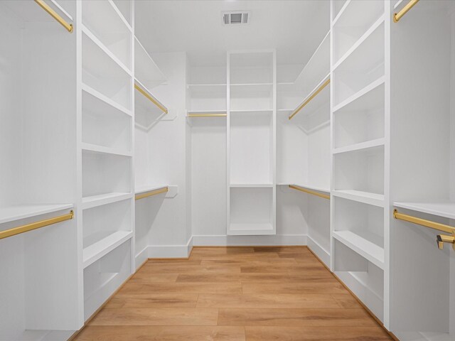 spacious closet with light wood-type flooring