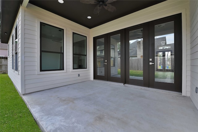 view of patio featuring french doors and ceiling fan