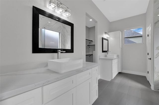 bathroom with vanity and tile patterned floors