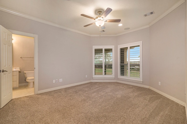 carpeted empty room with ornamental molding, a textured ceiling, and ceiling fan