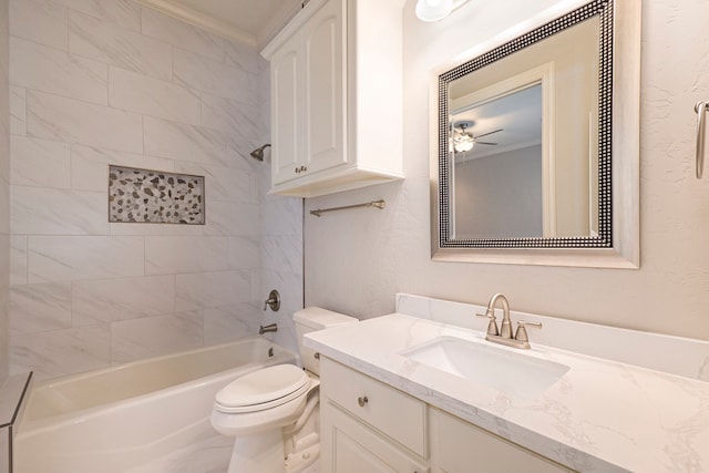 full bathroom with toilet, crown molding, tiled shower / bath combo, vanity, and ceiling fan