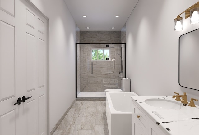 bathroom featuring vanity and shower with separate bathtub