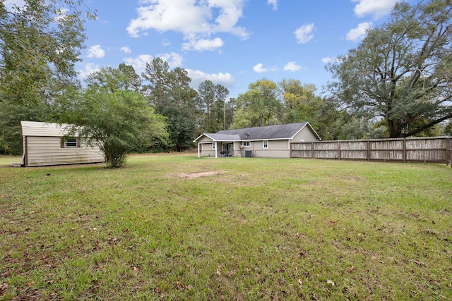 view of yard with a storage shed