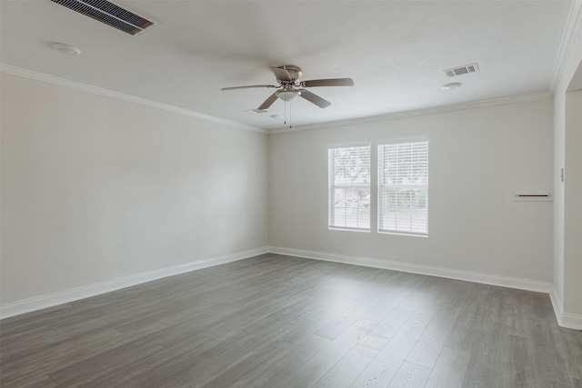 empty room featuring ornamental molding, hardwood / wood-style floors, and ceiling fan