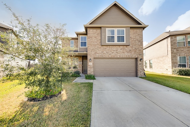 front facade featuring a front lawn and a garage