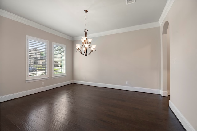 unfurnished room with crown molding, dark wood-type flooring, and a chandelier