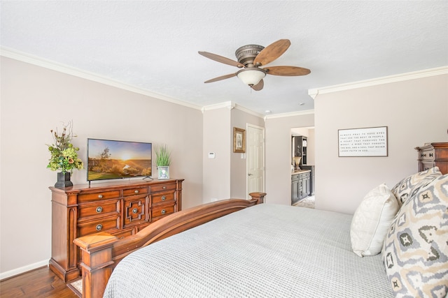 bedroom featuring wood-type flooring, ensuite bath, crown molding, a textured ceiling, and ceiling fan