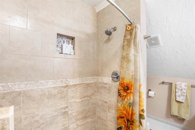 bathroom with curtained shower