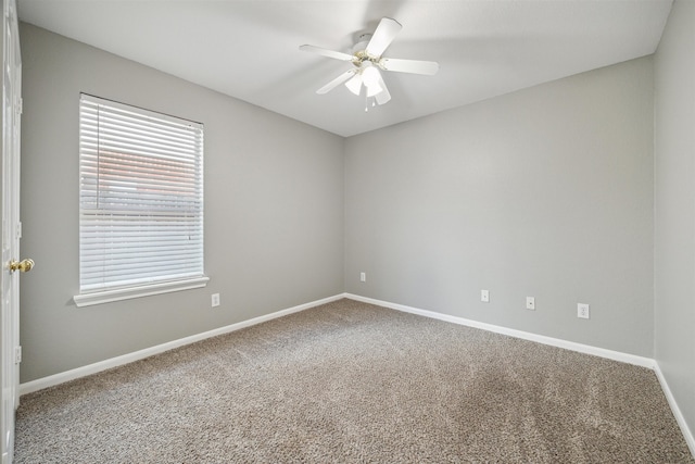 unfurnished room with carpet and ceiling fan