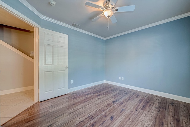 unfurnished bedroom with light wood-type flooring, ceiling fan, and ornamental molding