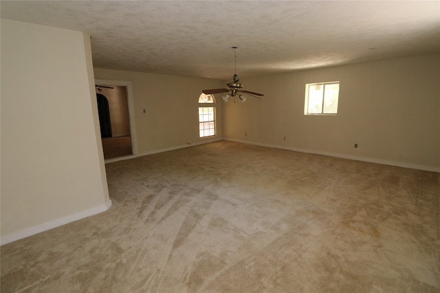 20 Ranchero Rd, College Station, TX 77845 - empty room featuring a textured ceiling, light colored carpet, and ceiling fan
