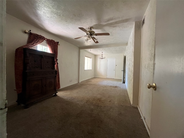 20 Ranchero Rd, College Station, TX 77845 - interior space with carpet, a textured ceiling, and a wealth of natural light