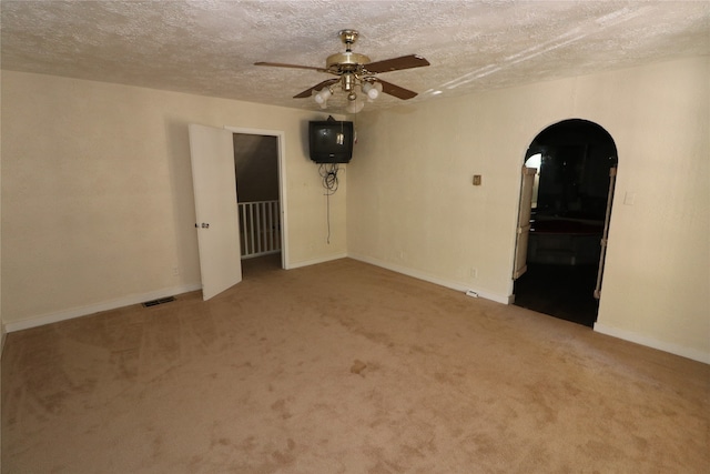 20 Ranchero Rd, College Station, TX 77845 - empty room with ceiling fan, a textured ceiling, and carpet floors