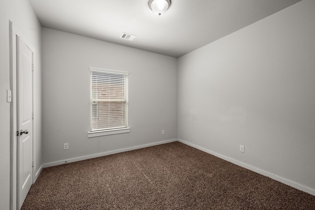 empty room with carpet floors