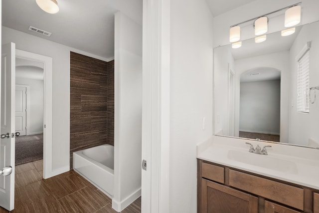 bathroom with vanity and shower / bath combination