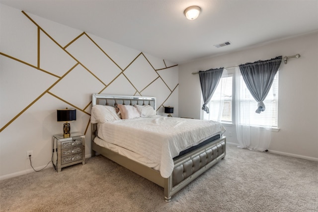 bedroom with light colored carpet