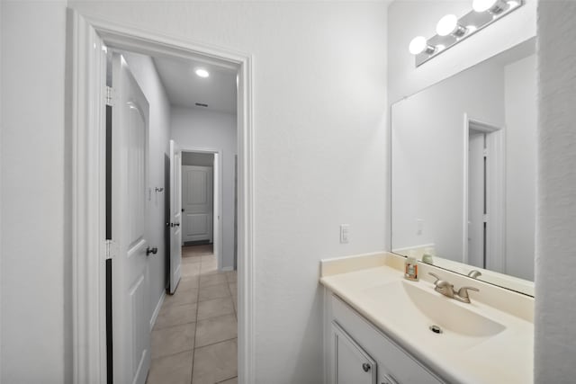 bathroom with vanity and tile patterned floors