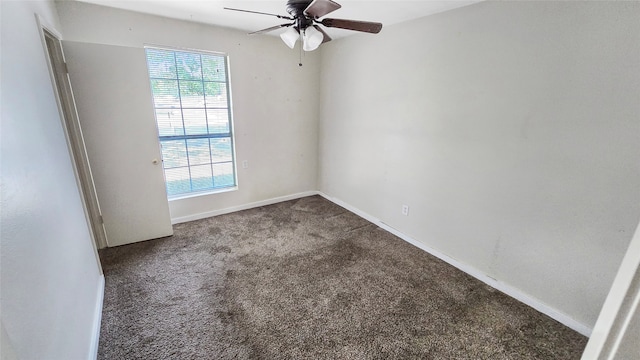 carpeted empty room with ceiling fan