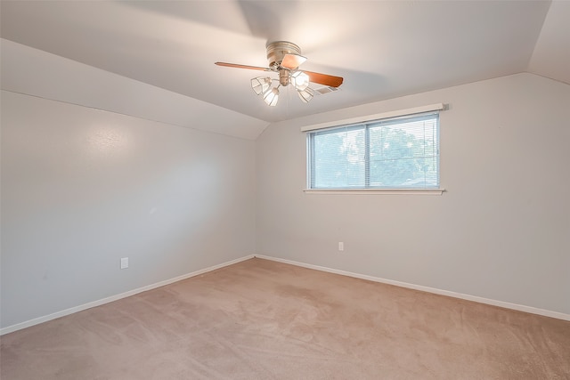 bonus room with light carpet, lofted ceiling, and ceiling fan