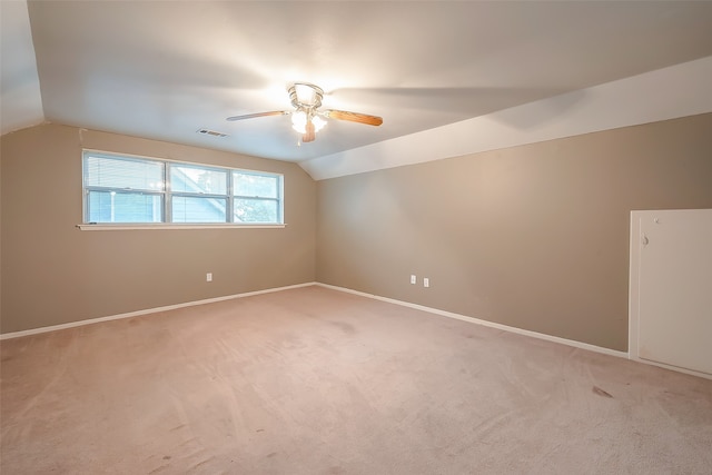 bonus room with lofted ceiling, carpet flooring, and ceiling fan