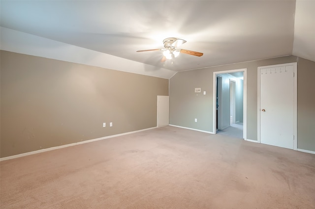 bonus room featuring ceiling fan, lofted ceiling, and light colored carpet