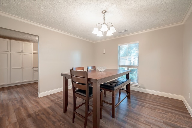 dining room featuring crown molding, a textured ceiling, a chandelier, and dark wood-type flooring