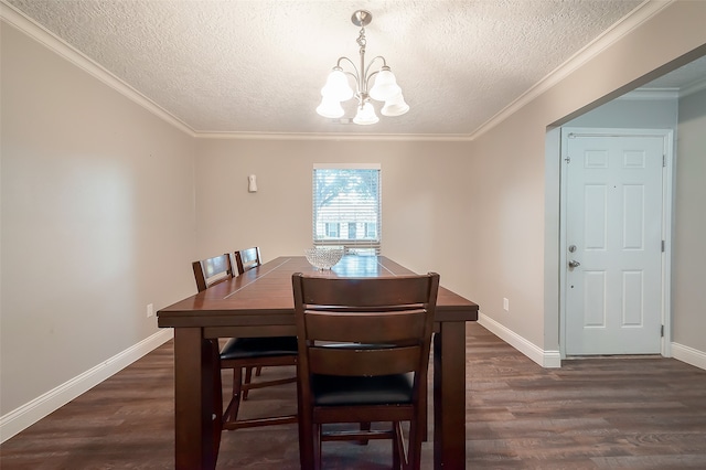 dining room featuring ornamental molding, a notable chandelier, dark hardwood / wood-style floors, and a textured ceiling