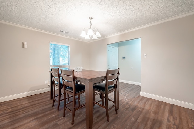 dining room with ornamental molding, a chandelier, a textured ceiling, and dark hardwood / wood-style flooring