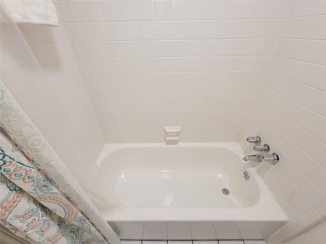 bathroom featuring a tub