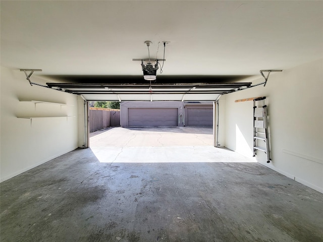 garage featuring a garage door opener