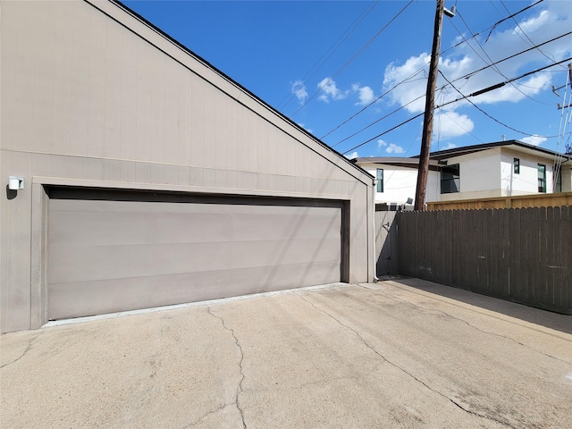 garage featuring fence