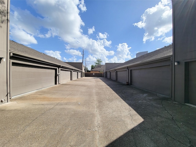 view of street with community garages