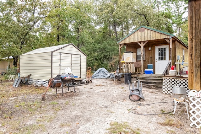 view of patio / terrace featuring a storage shed