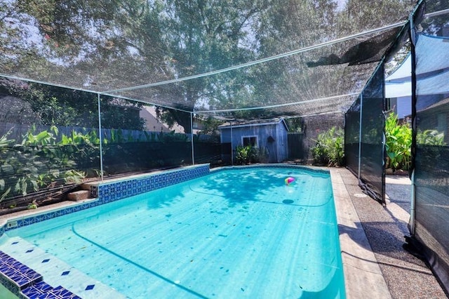 view of pool with a storage unit