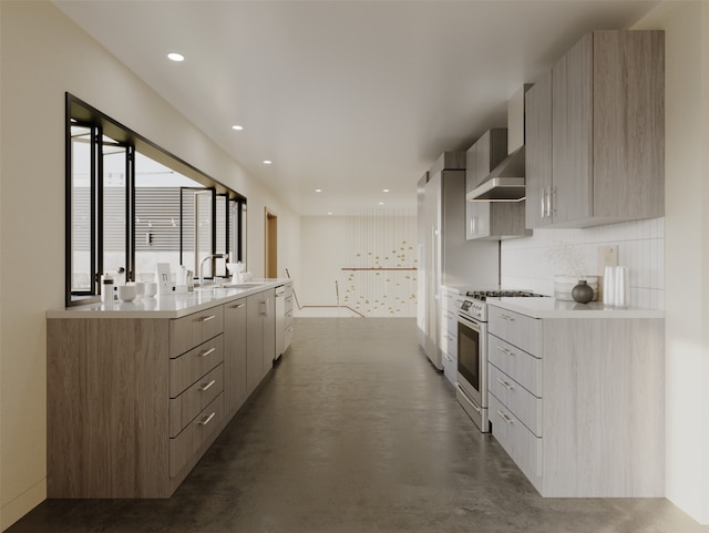 kitchen featuring wall chimney range hood, light brown cabinets, decorative backsplash, sink, and high end range