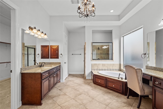 bathroom with vanity, an inviting chandelier, independent shower and bath, and tile patterned flooring