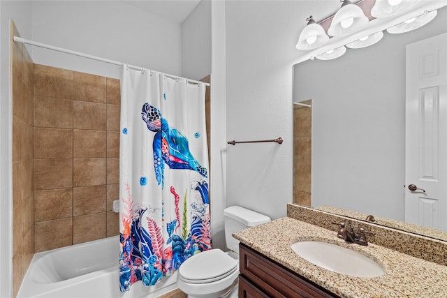 full bathroom with vanity, shower / bath combo, and toilet