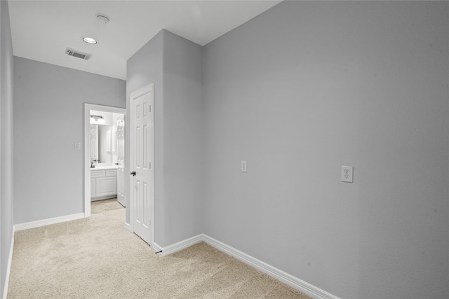 interior space with light colored carpet