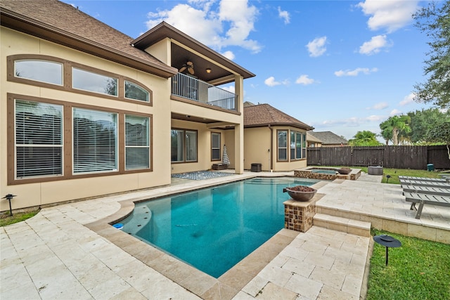 view of pool featuring an in ground hot tub and a patio area